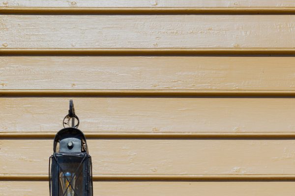 old-fashioned-looking-lamp-hanging-on-an-old-woode-2025-10-28-21-14-56-utc